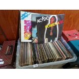 A collection of LPs, various genre, rock and pop including AC/DC.