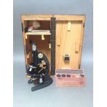 A cased Winkel Zeiss microscope no. 70108.