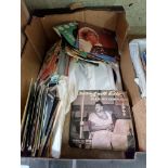 A box of assorted 45s.