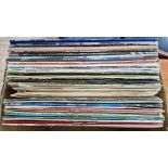 A mixed box of LPs and 12" singles from 1970s to 1990s, together with 8 classic comedy LPs including