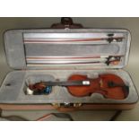 A German student violin, length 357mm, three bows 'Bausch', 'Paesold' and another.