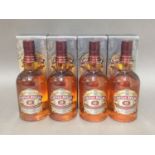 Four bottles of Chivas Regal 12 year old blended scotch whisky, 700ml, 40%, with boxes, good level.