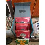 Four boxes of assorted 45s, various genre.