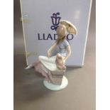 A Lladro figure Picture Perfect, no. 7612, height 22cm, with box. Condition - good, appears damage/