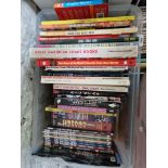 A box of various comics and related books to include The Silver Age of Comic Book Art by Schumer,