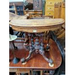 A Victorian inlaid walnut demi-lune card table.