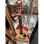 A Burswood acoustic guitar