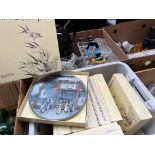 A box of Chinese collector's plates.