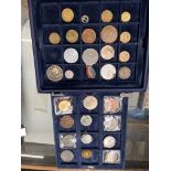 A case of world coin, medallions and tokens etc.