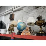 6 table lamps to include figural, illuminated globe, chromed, brass, etc. together with a white