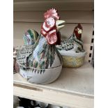 Two modern Chinese porcelain hens on nests