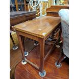 A mid 20th century teak fold top trolley table.