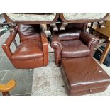 A leather armchair with matching stool and a vintage leather armchair
