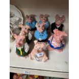 Eight Nat West Wade pigs