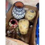 A box of vases to include lidded ones and small figures.