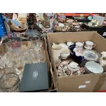 A box of mixed pottery including tea cups, saucers, cow creamers etc and a box of glassware.