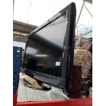 A 32" Panasonic LCD tv with remote