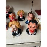Five plastic Spitting Image busts