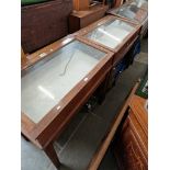 A pair of glazed mahogany display tables.