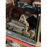 A box of vintage handbags