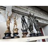 Two pairs of spelter figures and another
