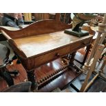 A Victorian mahogany washstand on turned supports (some later elements).