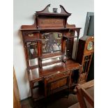 A late Victorian inlaid rosewood mirror back chiffonier.