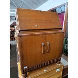 A 1930s oak bureau.