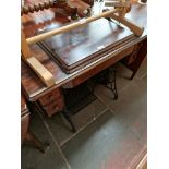 An antique Singer treadle sewing machine,