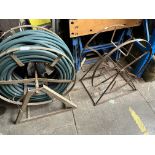 2 metal hose pipe reels, including one with plastic hose