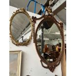 Two classical style mirrors.