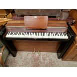 An Eavestaff Art Deco style 'Minipiano' upright piano.