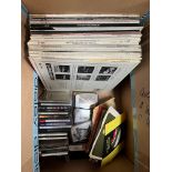 A box of assorted LPs, CDs, music cassettes & 45s