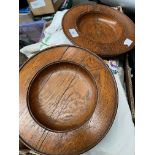 A pair of oak church offertory plates.