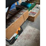 7 boxes of 45s, LPs, music cassettes and CDs.