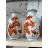 Pair of modern Chinese vases depicting dragons