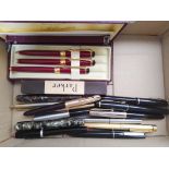 A box of assorted mainly vintage pens including Parker etc.