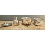 A mixed lot of hallmarked silver items comprising ashtray, cream jug, footed bowl, and