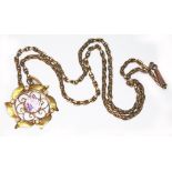 An antique seed pearl and amethyst pendant, on 44cm chain, both marked '9ct', gross wt. 8.1g.