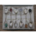 A cased set of Chinese silver teaspoons with multi-coloured jade finials, marked 'MADE IN HK 90%