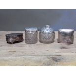 Hallmarked silver comprising a trinket box, a cigarette box and two silver topped jar/bottle.