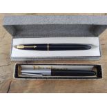 Two vintage Parker pens with 14ct nibs.