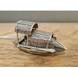 A novelty Chinese silver model of a boat, gross wt. 21.6 g.