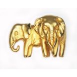 A novelty brooch modelled as two elephants, marked '375' length 28mm, wt. 8.7g.