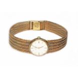 A ladies 9ct gold Omega bracelet watch, case diam. 20mm, 9ct gold strap length 15.5cm to 16.5cm,