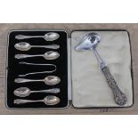 A csed set of six hallmarked silver spoons with sugar tongs and a Norwegian ladle with handle marked