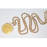 An Edward VII 1903 half sovereign mounted in hallmarked 9ct gold and hung on 50cm rope twist chain