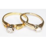 Two diamond solitaire rings; one hallmarked 18ct gold wt. 2.4g size J and the other hallmarked 9ct