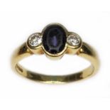 An 18ct gold iolite and diamond ring, sponsor 'DOM', gross wt. 4.3g, size L. Condition - excessive
