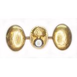 A brooch formed from cufflinks, three oval panels, one monogrammed, one with Royal Fusileers